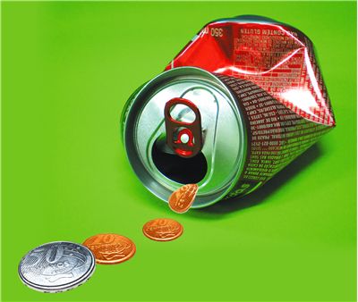 Picture Of Can Of Soft Drink And Coins