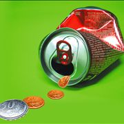 Picture Of Can Of Soft Drink And Coins
